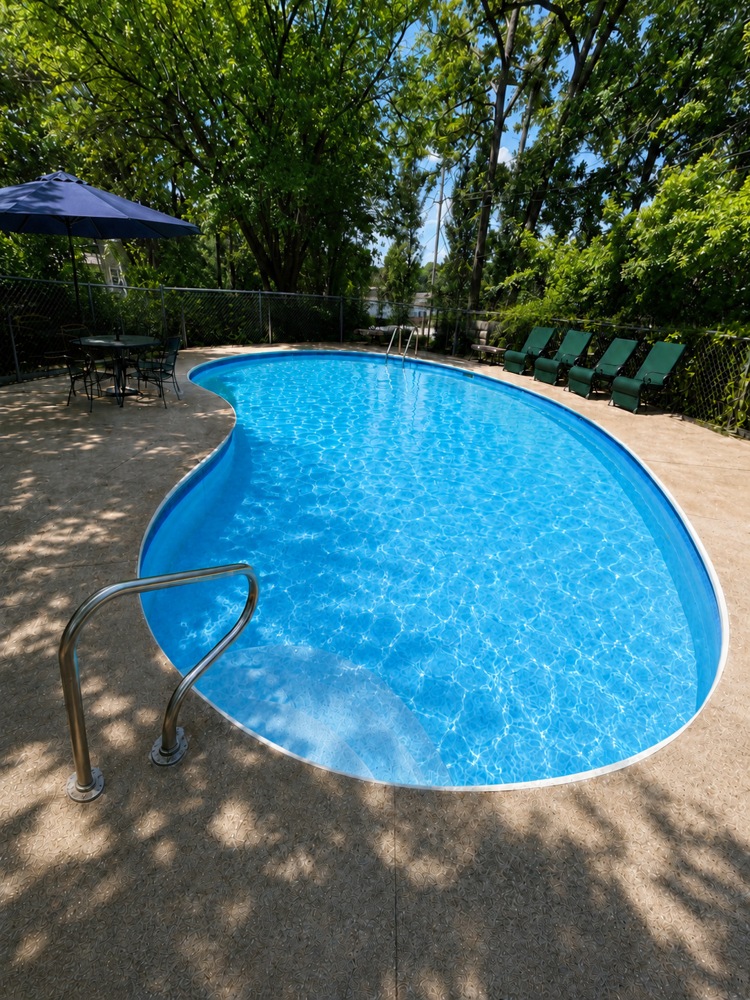 The private swimming pool at Morningside Village on a sunny summer day